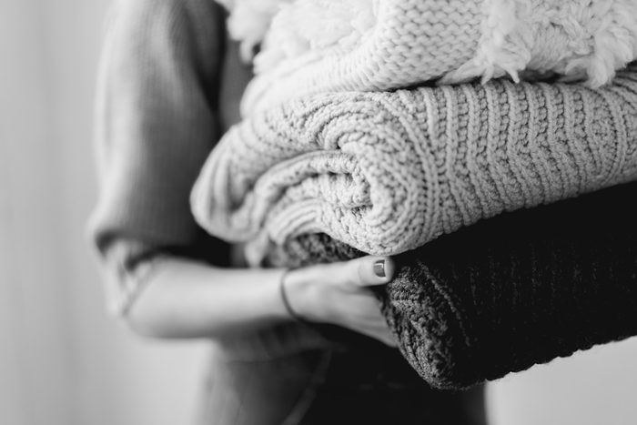 Folded knitwear sorted by fabric type